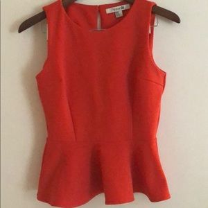 Orange peplum top